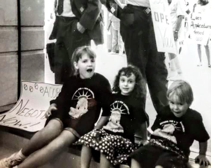 Anna Poe-Kest (middle) and two other kids at the 1992 ACORN convention in NYC.
