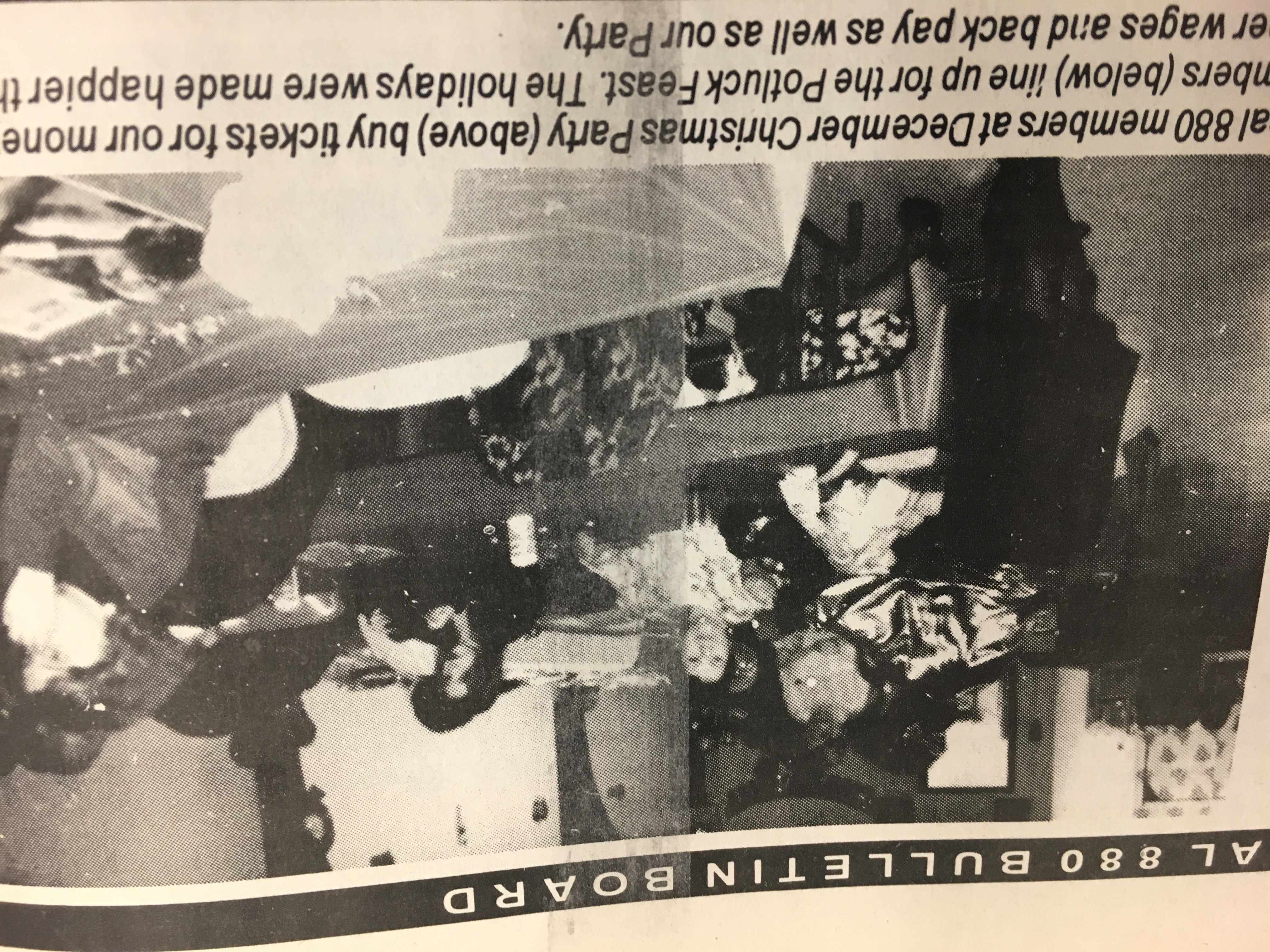 Clipping of a photograph of Local 880 members at their Christmas Party.