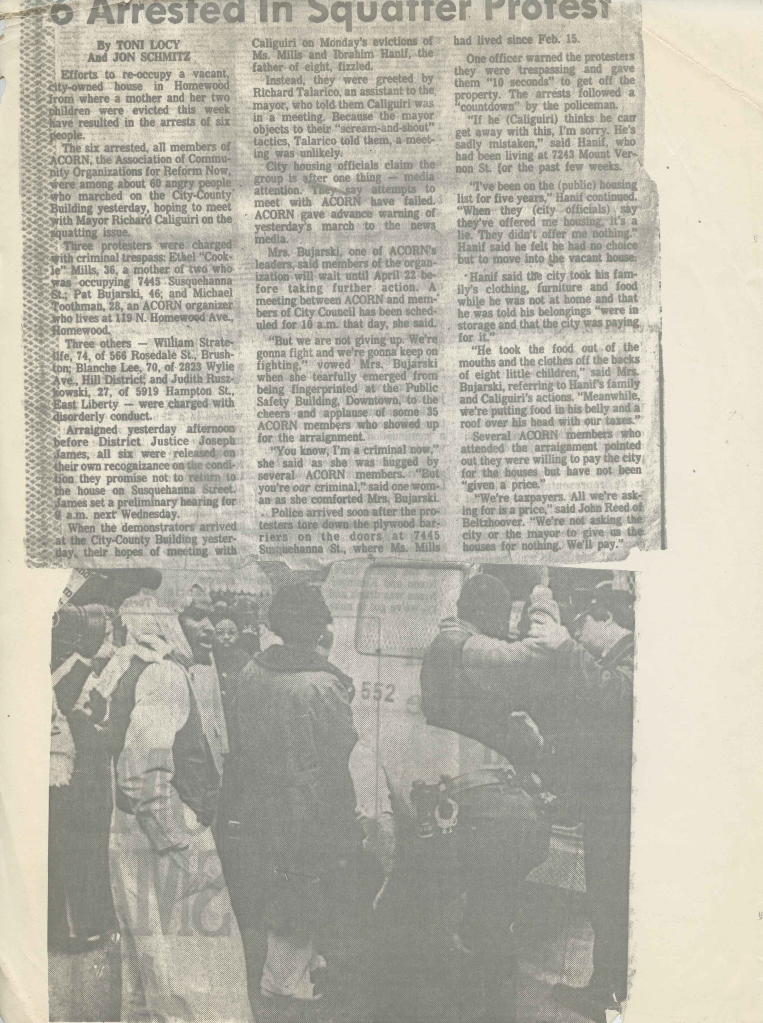 Newspaper clipping of an article about six ACORN members who were arrested at a squatter protest.