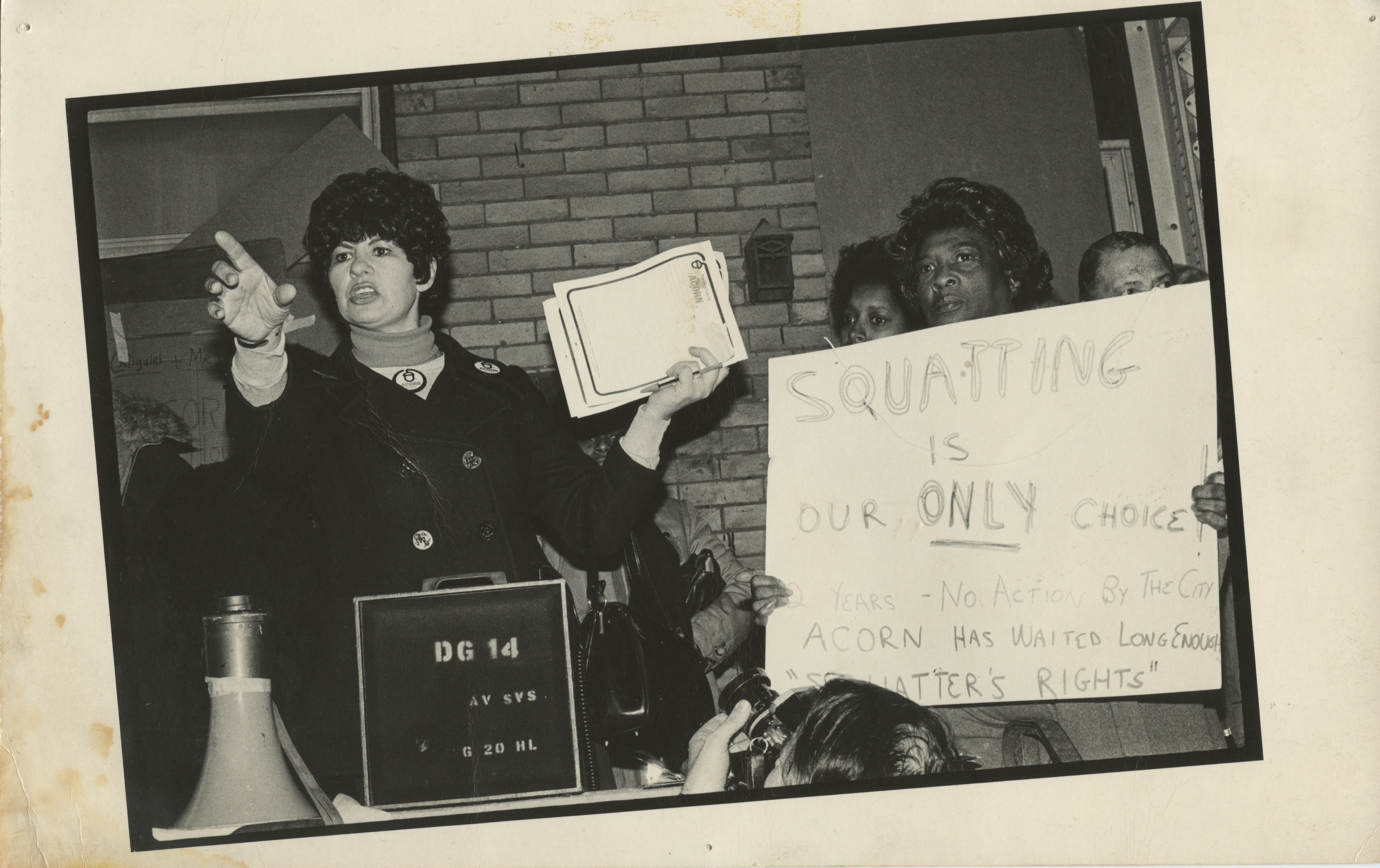 Photograph of women demonstrating for “squatters rights”.
