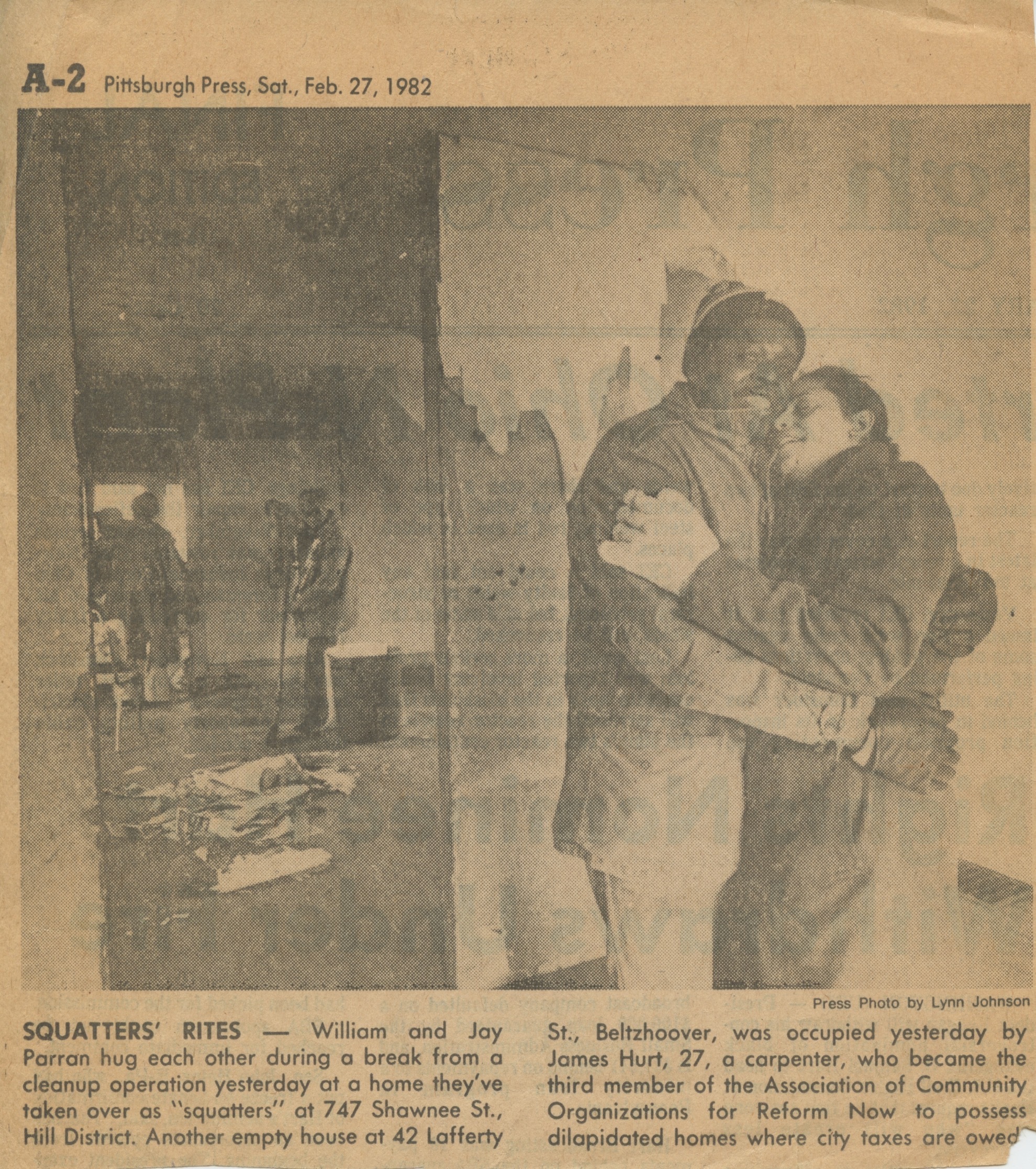 Newspaper clipping of an article and accompanying photographs in the Pittsburgh Press on February 27, 1982 about ACORN members rehabbing a home as part of the squatting campaign.