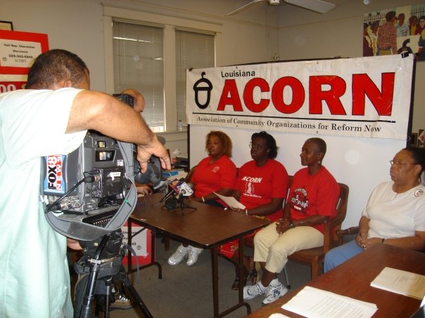 Photogprah of Louisiana ACORN members sitting for a press conference.