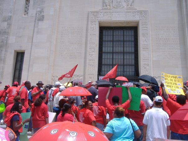 Photograph of an ACORN action in New Orleans in the wake of Hurricane Katrina (photo credit: Tanya Harris-Glasow or Marie Hurt).