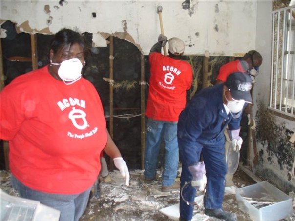 Photograph of ACORN organizer Tanya Harris-Glasow and others fixing a house in New Orleans in the wake of Hurricane Katrina (photo credit: Marie Hurt).