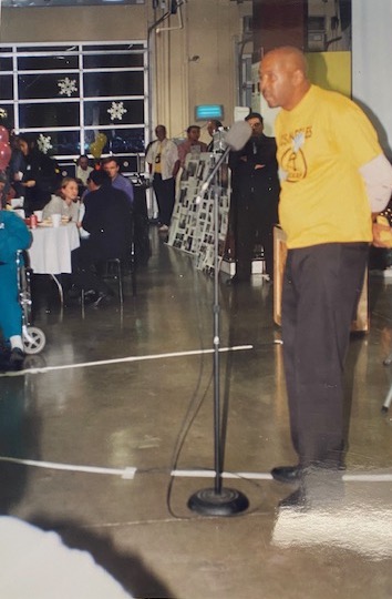 Photograph of ACORN California Head Organizer John Jackson speaking at an event.