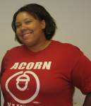 Organizer Katelyn Johnson in a red ACORN T-shirt.