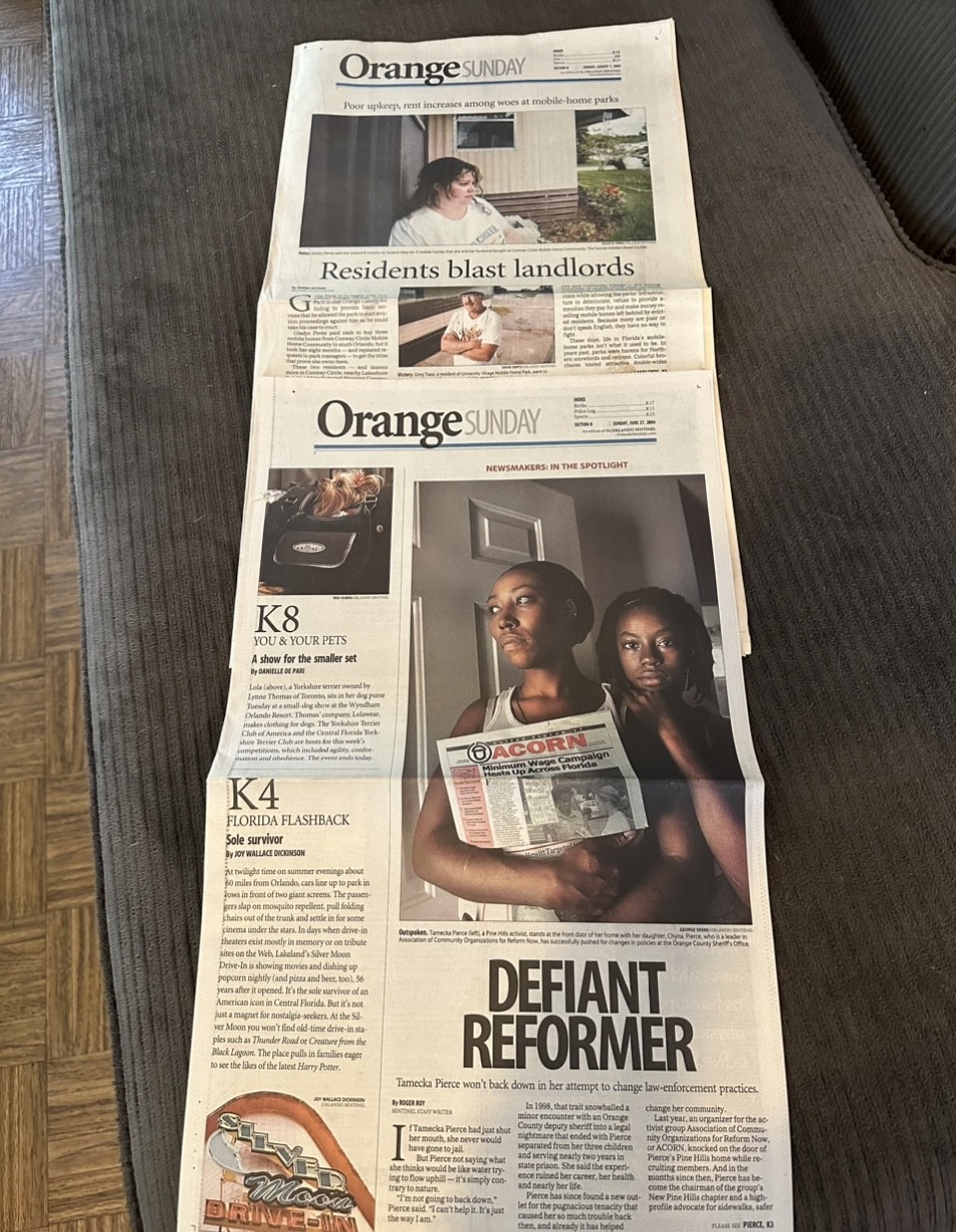 Photograph of an Orlando Sentinel article from June 27, 2004 about ACORN’s racial profile police misconduct campaign in Florida, featuring ACORN member/leader Tameka Pierce.