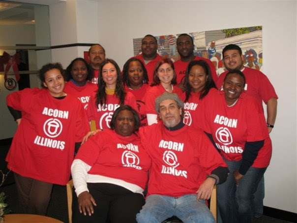 Photograph of ACORN Oragnizer Susan Ritacca and a group of member/leaders, all wearing red ACORN Illinois T-shirts.