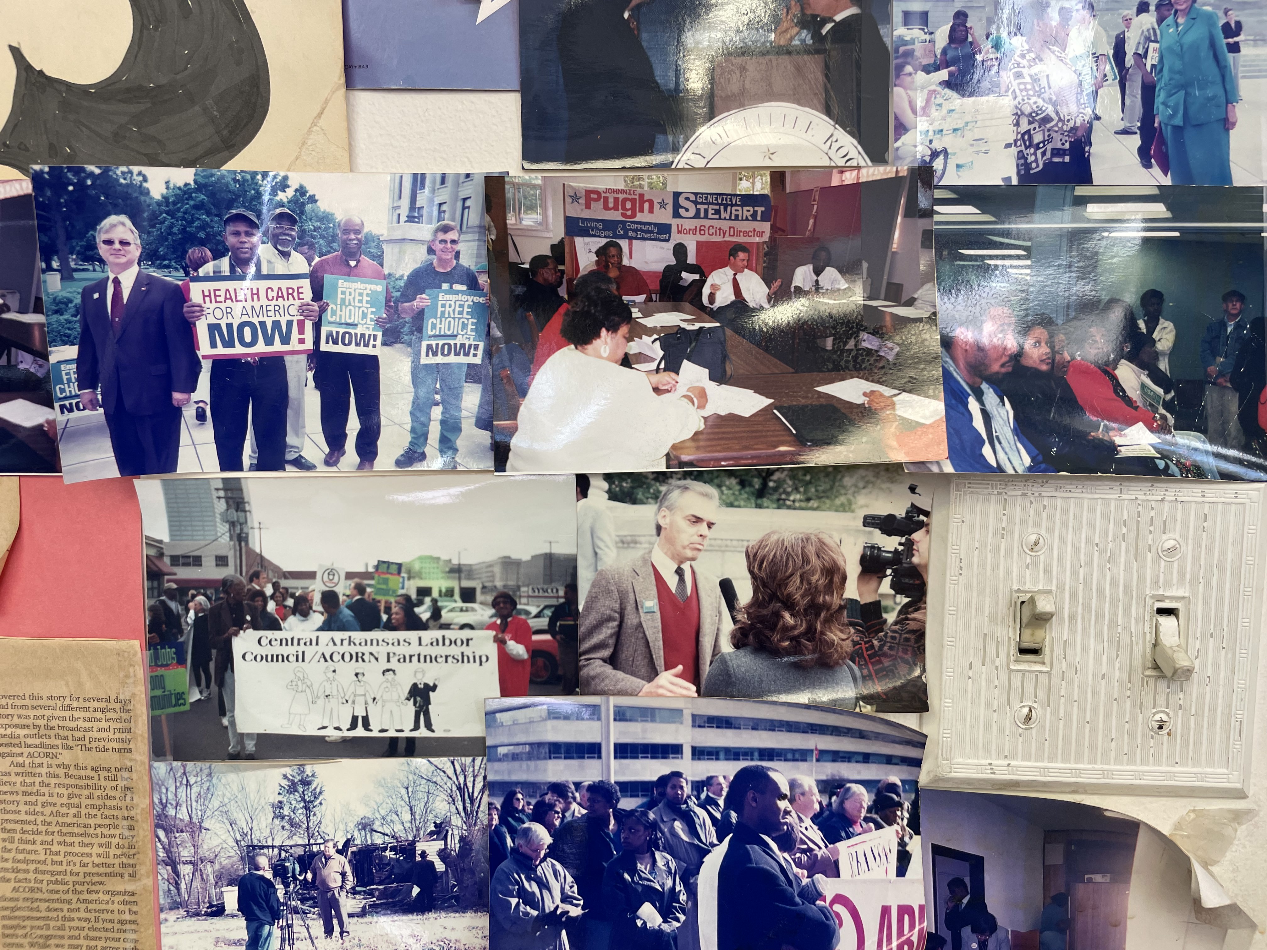 Photographs covering the wall at the Arksansas Community Organizations (ACO) office in Little Rock, Arkansas.