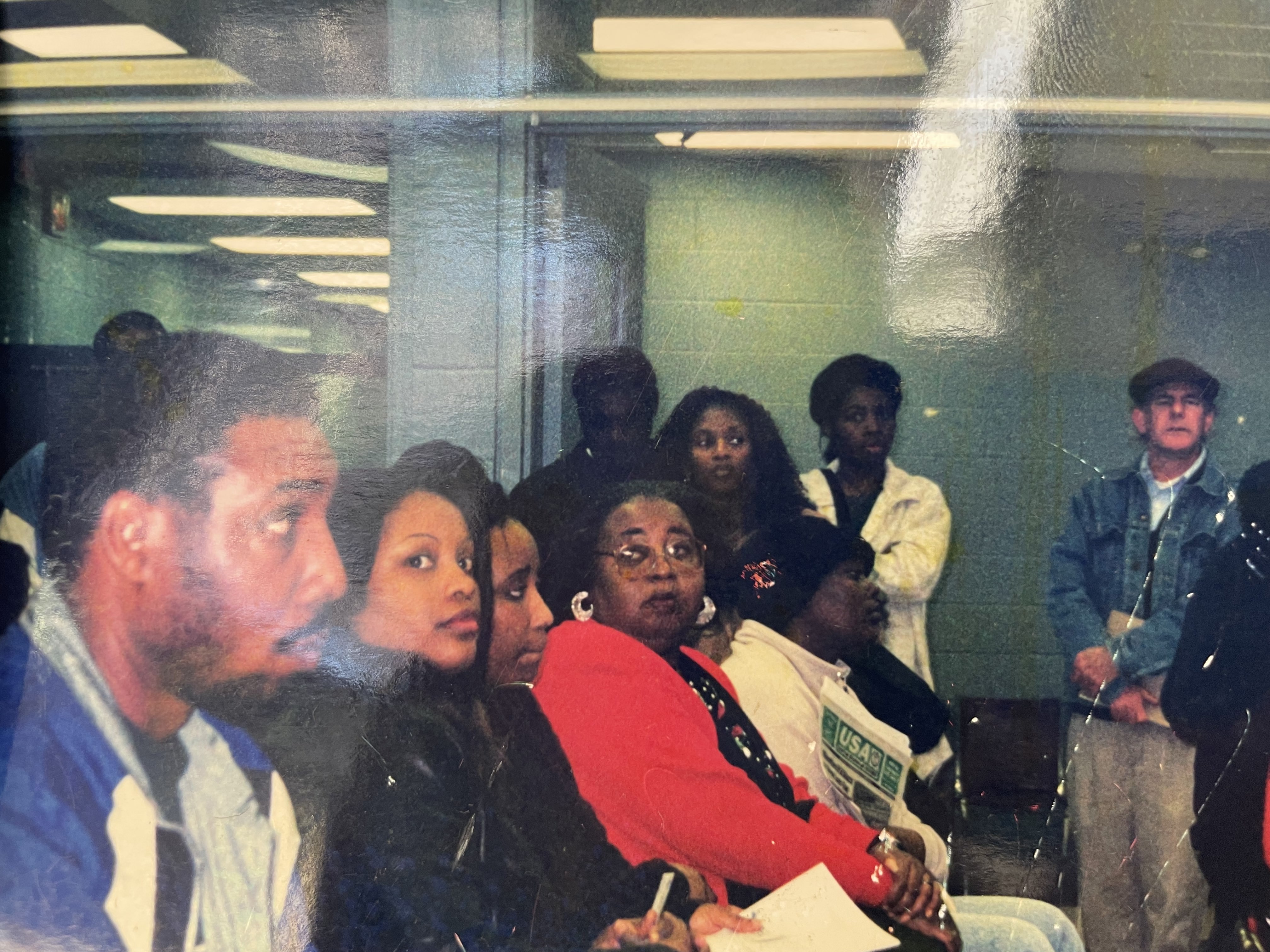 Photograph from the Arkansas Community Organizations (ACO) office in Little Rock, Arkansas. Neil Sealy on the far right.