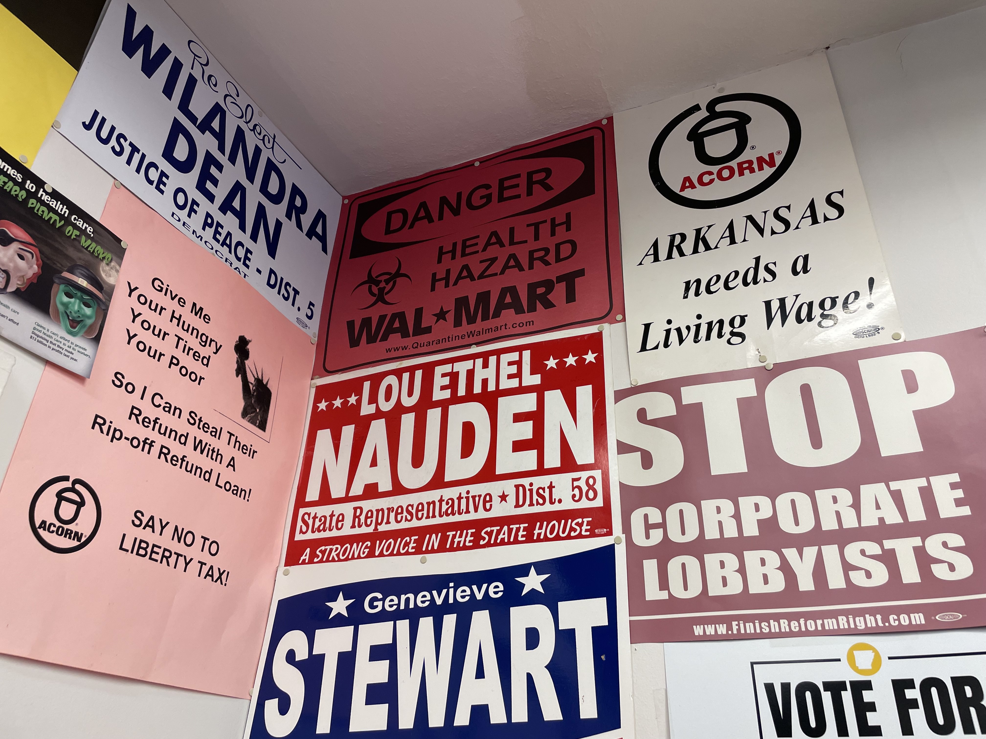 Photograph of posters covering the walls at the Arksansas Community Organizations (ACO) office in LIttle Rock, Arkansas