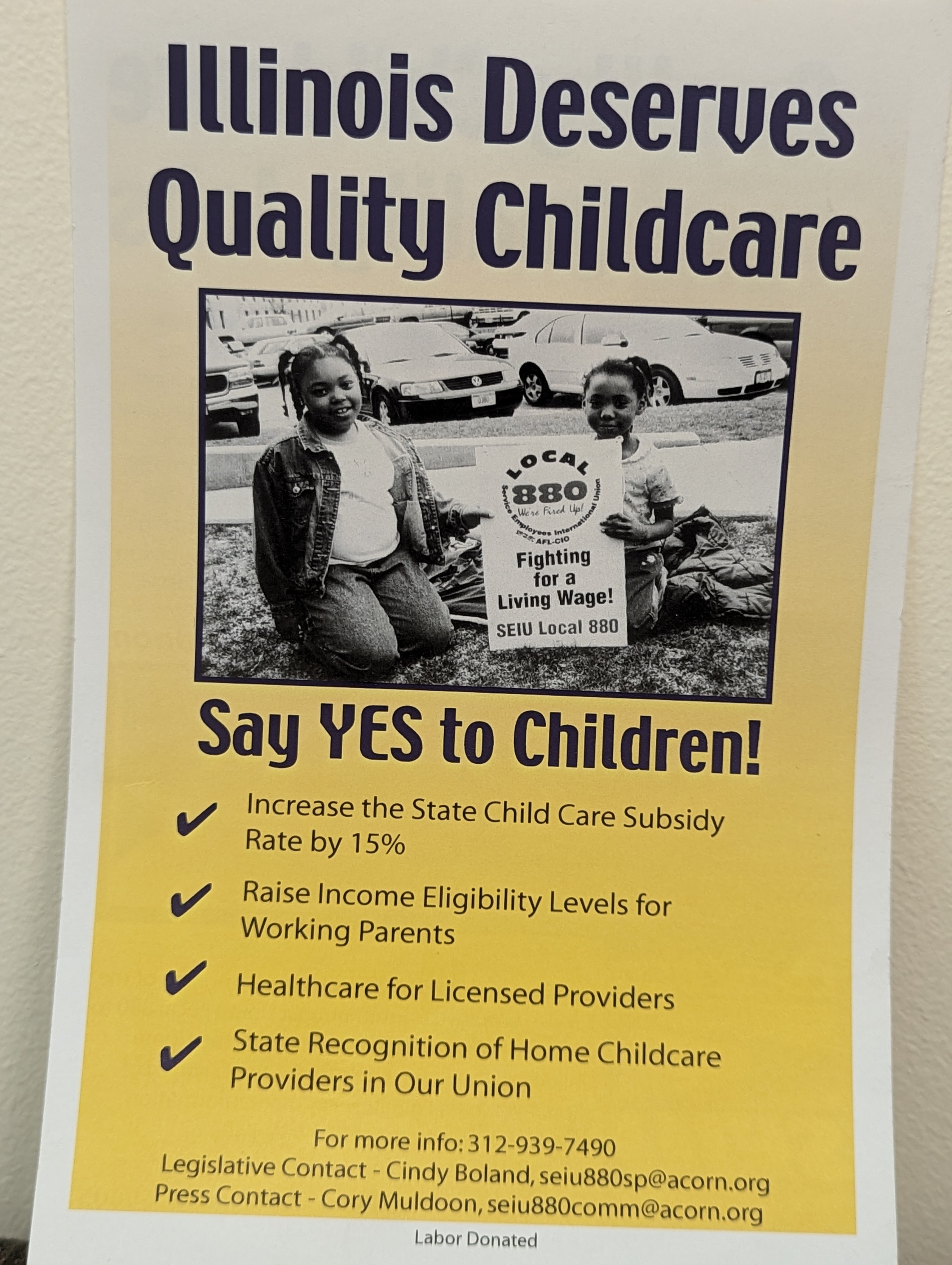 Photograph of an SEIU Local 880 poster that says, “Illinois Deserves Quality Childcare”.